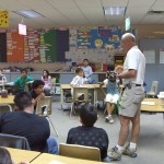 Chuck at snake program in school Chuck presenting snake program